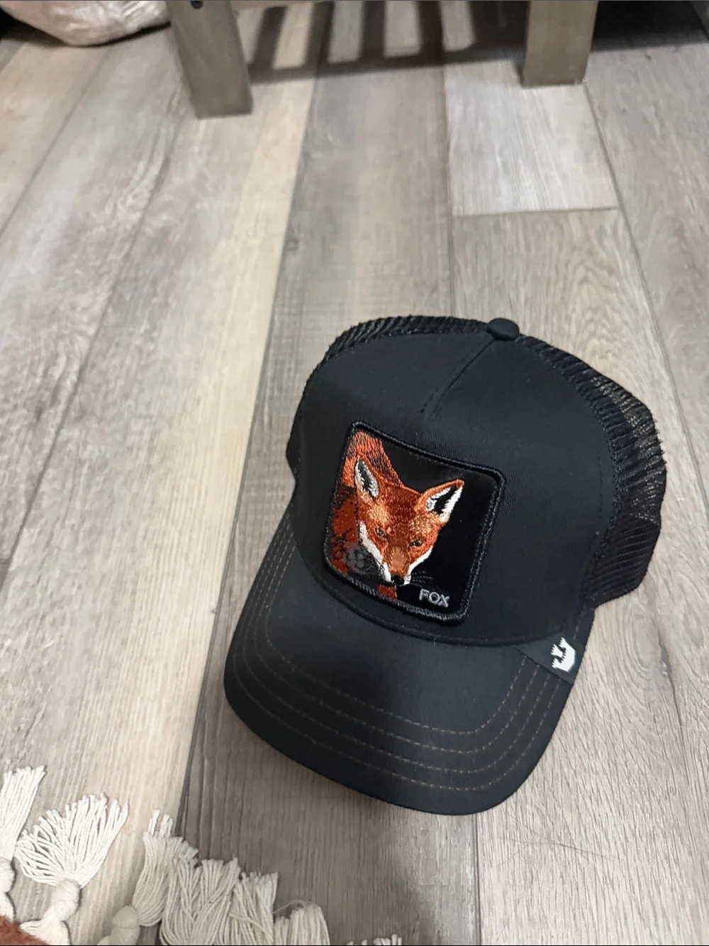 Goorin Bros Black Trucker Hat with Orange Fox Patch